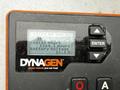 A digital control panel for a 2005 Katolight SED60FPJ4 generator displaying engine hours and battery voltage