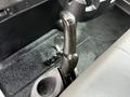 A gear shift lever in a 2022 International MV607 vehicle interior