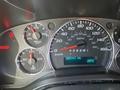 Dashboard of a 2020 Chevrolet Express showing speedometer fuel and temperature gauges with a digital odometer reading 285942 km and interior temperature at 23 degrees Celsius