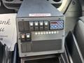 Control panel with multiple switches and buttons inside a 2020 Mercedes-Benz Sprinter 2500 van