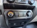 The image shows the dashboard controls of a 2020 Ford F-550 including climate control knobs and buttons for air conditioning and ventilation