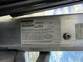 2008 Kenworth T370 truck with a visible information plate detailing vehicle emissions control and manufacturing information