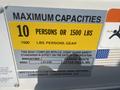 A capacity label for a 2013 Larson 238 boat indicating a limit of 10 persons or 1500 lbs including gear with manufacturer's details and compliance information