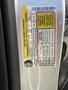 A 2014 Ford Escape with a tire and loading information label detailing tire specifications and load limits