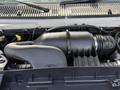 The image shows the engine compartment of a 2008 Ford Econoline with the air intake system prominently displayed