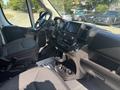 Interior view of a 2022 RAM Promaster 350 featuring the driver's seat steering wheel and dashboard with control panel