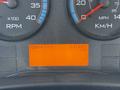 Dashboard display of a 2009 International 3000 CE showing RPM and speedometer gauges along with an odometer reading of 141043 KM