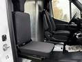 2023 Mercedes-Benz Sprinter with a driver seat and a foldable passenger seat in black upholstery