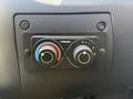 Control panel with dials for temperature and fan speed settings in a 2021 RAM Promaster