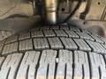 Close-up of a tire from a 2017 Ford Transit-350 showing detailed tread patterns and grooves