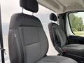 Two comfortable gray fabric seats in a 2023 RAM Promaster 3500 with headrests and ergonomic design for driver and passenger comfort