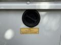 A 2016 Ford Transit gas fill cap with a safety label indicating usage instructions