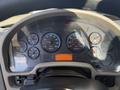 Dashboard of a 2017 International 4300 featuring various gauges for speed RPM and temperature with a digital display in the center