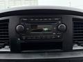 Dashboard of a 2008 Sterling Bullet featuring a car radio and control buttons with a display showing the time as 4:34