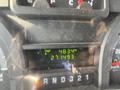 The dashboard of a 2012 Ford Econoline showing a trip distance of 483.4 km and an odometer reading of 271493