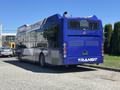 A 2018 Grande West Vicinity bus in blue and white with "TRANSIT" written on the side and a rear exhaust system