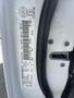 A close-up view of the door jamb label of a 2012 RAM 2500 displaying vehicle specifications and information