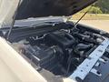 A 2017 Chevrolet Colorado engine with visible components including a black air intake and various pipes and wires