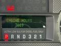 A digital display panel of a 2008 Ford F-550 showing the engine hours as 7663 with indicators for brake and gear selection