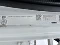 2013 Freightliner 114SD with a label indicating it is an incomplete vehicle showing various vehicle details and specifications