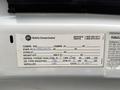 A service label for a 2017 Ford E450 detailing part numbers compressor information refrigerant type and oil type with installation date of February 14 2017