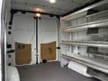 Interior of a 2017 Mercedes-Benz Sprinter van showing the cargo area with shelving and double rear doors
