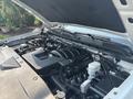 The image shows the engine compartment of a 2017 Chevrolet Silverado 1500 with a visible V8 engine and various components like the air intake and battery