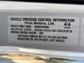 A label detailing the vehicle emission control information for a 2020 Hino 338 including vehicle family name and regulatory details