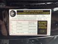 A 2016 Mercedes-Benz GLA-250 with a tire and loading information label displaying specifications for seating capacity, tire dimensions, and pressure recommendations