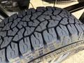 Close-up of a tread pattern on a tire from a 2023 Mercedes-Benz Sprinter 2500 showcasing deep grooves and a rugged design for enhanced traction