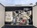 A Katolight SED60FPJ4 generator with a prominent control panel various wires and components visible within a metal enclosure