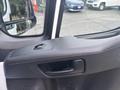 Interior door panel of a 2023 RAM Promaster 3500 featuring a handle and window control buttons