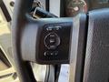 Close-up of a 2017 Ford F-650 Super Duty steering wheel control panel featuring buttons for information setup and settings