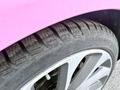 Close-up of a tire on a 2020 Jaguar XE showing tread patterns and wheel rim details