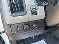 Interior controls of a 2017 Chevrolet Colorado including knobs for vehicle lighting and settings