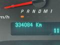 The dashboard of a 2020 Chevrolet Express displaying a mileage of 384084 kilometers and a speedometer needle pointing to a speed