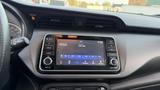 Interior dashboard of a 2019 Nissan Kicks featuring a touchscreen audio display with various options and buttons for settings and media