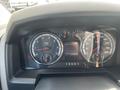 Dashboard of a 2012 RAM 2500 showing speedometer and tachometer with various gauges and digital display