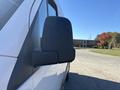 2021 Mercedes-Benz Sprinter 2500 side mirror prominently displayed with a sleek black design and integrated features
