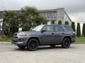A gray 2021 Toyota 4Runner parked with black alloy wheels and a modern design