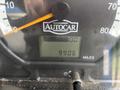 Close-up of the dashboard of a 2017 Autocar Xpert showing a digital odometer reading 9906 miles and a fuel gauge indicating full