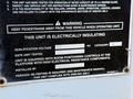 A black and white warning label detailing electrical safety and equipment specifications for a 2013 International 7400 vehicle