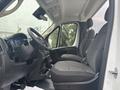Interior view of a 2023 RAM Promaster 3500 showing front seats dashboard and steering wheel