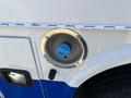 Fuel cap opening of a 2017 Chevrolet Colorado with a blue cap