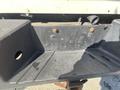 Close-up of the rear bumper area of a 2016 Ford F-250 SD showing an empty hitch receiver and visible mounting points