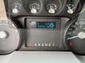 The dashboard display of a 2013 Ford F-250 SD showing trip A as 0.0 km and odometer reading of 130912 km