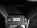 A control panel from a 2016 Subaru Forester featuring buttons for seat heating and X Mode settings