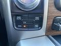 A control panel for a 2017 RAM 1500 featuring buttons for 2WD 4WD Auto 4WD Lock and 4WD Low with a knob for selecting drive modes