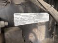 A vehicle emission control information label for a 2018 Ford Econoline showing engine specifications and compliance details