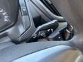 Close-up of the control stalk in a 2016 Ford Transit 150 used for operating lights and windshield wipers